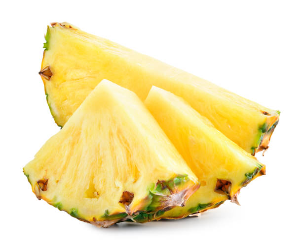 istock Pineapple slices and a half of pineapple ring. 1156645876