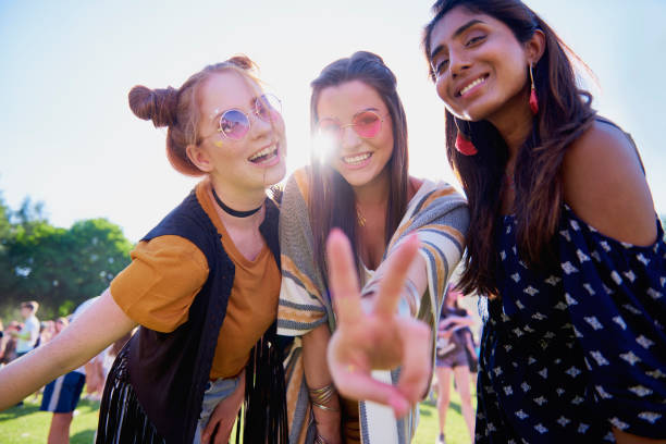istock Peace sign and three friends 1156648539