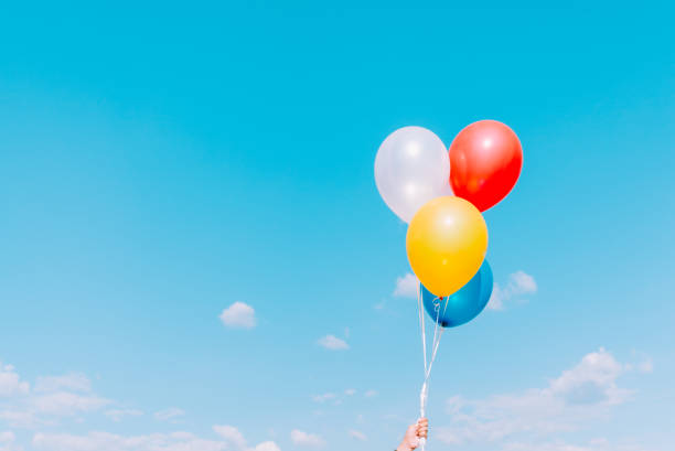 istock balloon with colorful on blue sky 1156649046