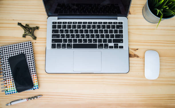 istock wooden desktop top view 1156649132