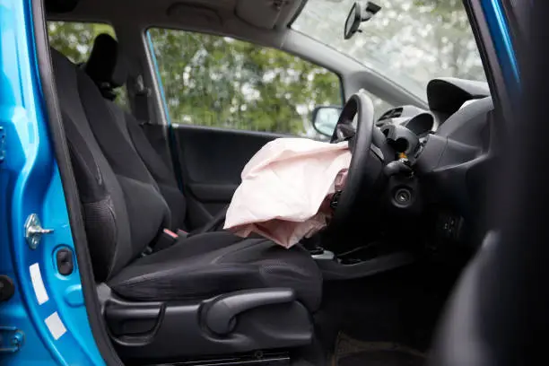 Interior Of Car After Accident With Safety Airbag Deployed