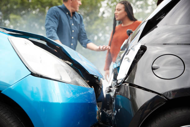 istock Two Angry Motorists Arguing Over Responsibility For Car Accident 1156652894