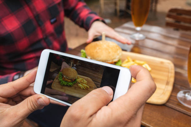 istock Influencer taking a photo for social media 1156654253