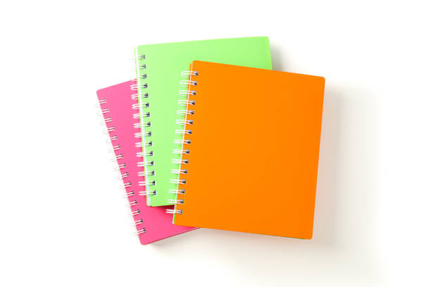 istock Color notebooks with space for text isolated on white background 1156655064
