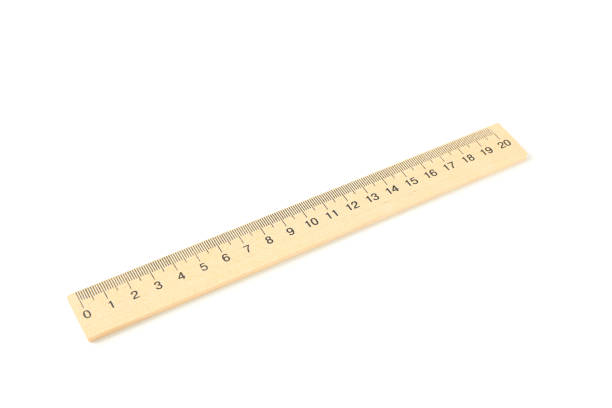 Wooden ruler isolated on white background. Stationery