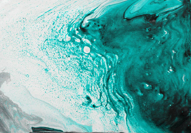 istock photography of abstract marbleized effect background. black, light turquoise and white creative colors. Beautiful paint 1156657252