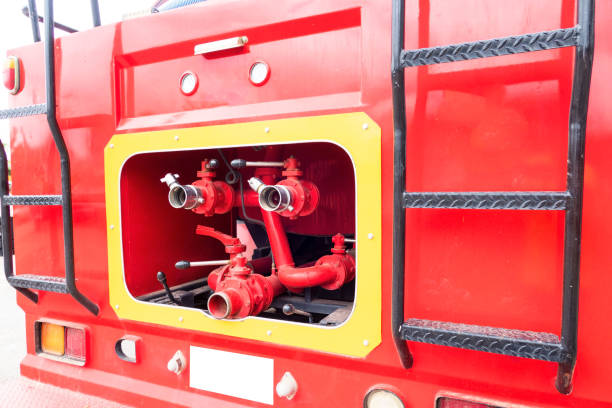istock closeup Red fire truck and fire hose ,fire & rescue 1156657396