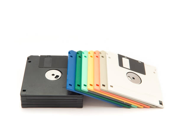 istock Stack of colorful floppy diskettes isolated on the white background. 1156659969