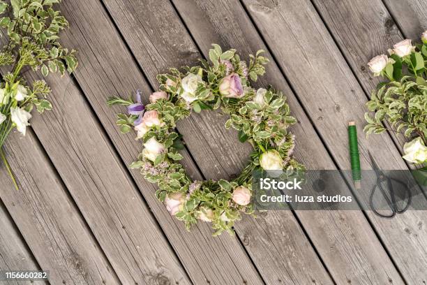 Woman Making A Flower Crown On Midsummer In Sweden Stock Photo - Download Image Now - Floral Crown, Wreath, Summer Solstice