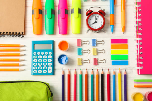 istock Flat lay composition with school supplies on white wooden background 1156663064