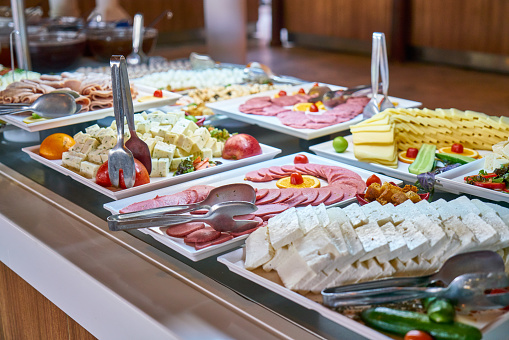 Buffet food, catering food party at restaurant, mini canapes, snacks and appetizers .