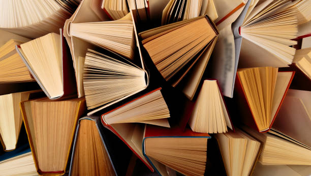 istock Old and used hardback books  top view - Image 1156669027