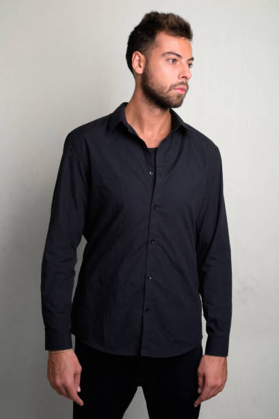 istock Studio shot of young handsome bearded businessman 1156669534