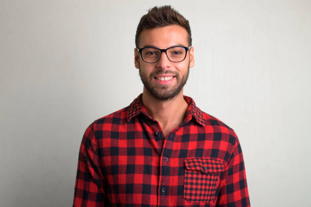 istock Young handsome bearded hipster man wearing eyeglasses 1156669679