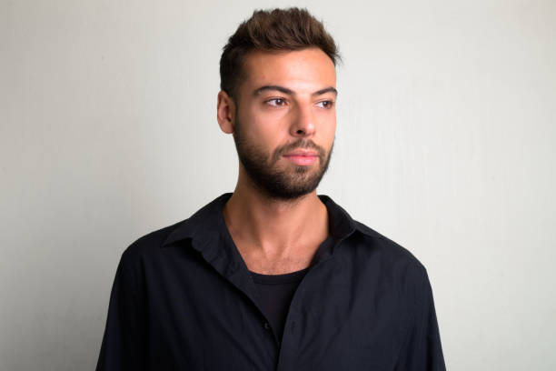 istock Studio shot of young handsome bearded businessman 1156670918
