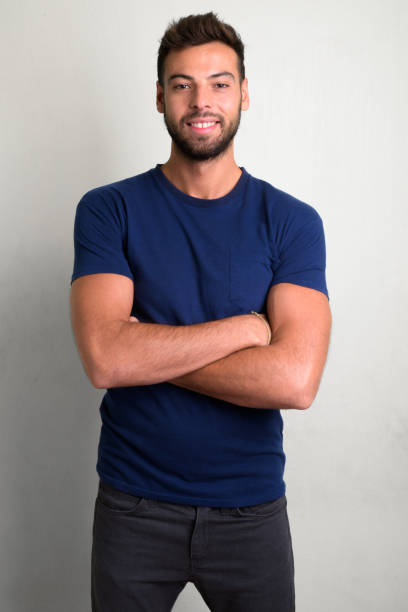 istock Studio shot of young handsome bearded man 1156671025