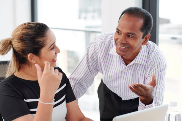 istock Business colleagues talking at office 1156672610