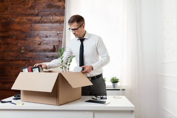 istock Businessman moving into a new office 1156675851