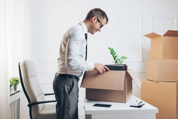 istock Businessman moving into a new office 1156676404