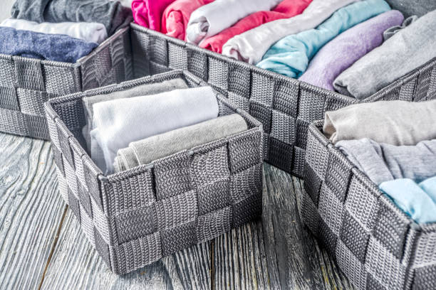 istock Vertical Marie Kondo tidying clothes method 1156676555