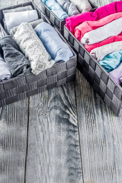 istock Vertical Marie Kondo tidying clothes method 1156676589