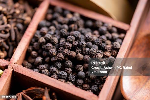 Black Pepper In A Box Of Spices Stock Photo - Download Image Now - Black Peppercorn, Close-up, Drink