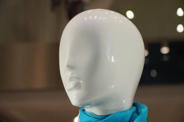 white head of shop dummy, abstract face,close-up, looking to the left