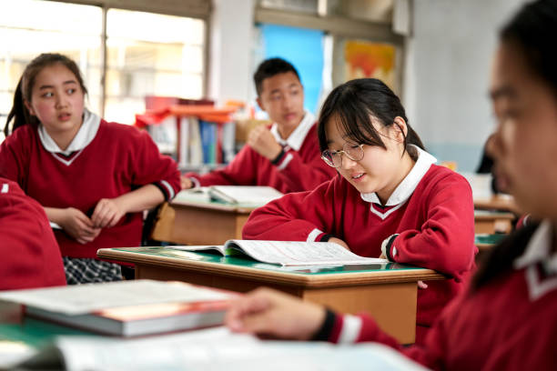 istock Teenage students studying in classroom 1156684772