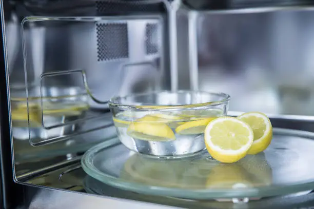 Photo of A method of cleaning in a microwave oven with water and lemon