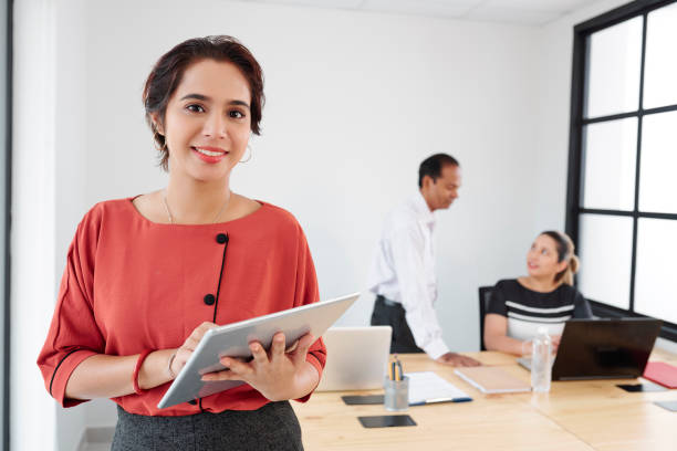 istock Businesswoman using tablet pc at office 1156686060
