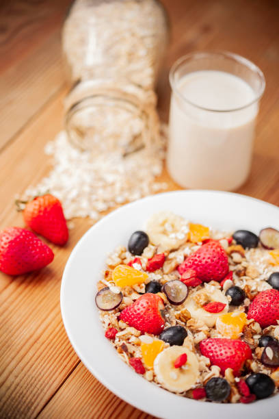 istock Healthy oats breakfast with various fruit toppings and soy milk. 1156691678