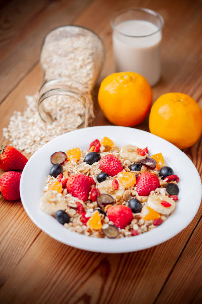 istock Healthy oats breakfast with various fruit toppings and soy milk. 1156691709