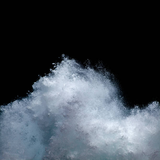 espuma de mar volando sobre espalda negro - churned fotografías e imágenes de stock