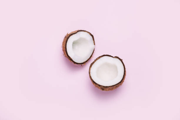 istock Coconut on pink background. Minimal concept. 1156695820
