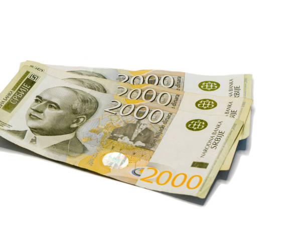 istock Three  banknotes worth 2000 Serbian Dinars with a portrait of a climate scientist Milutin Milankovic isolated on a white background 1156695966