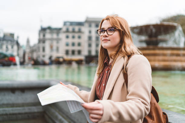 istock Tourist with a map of London 1156696120