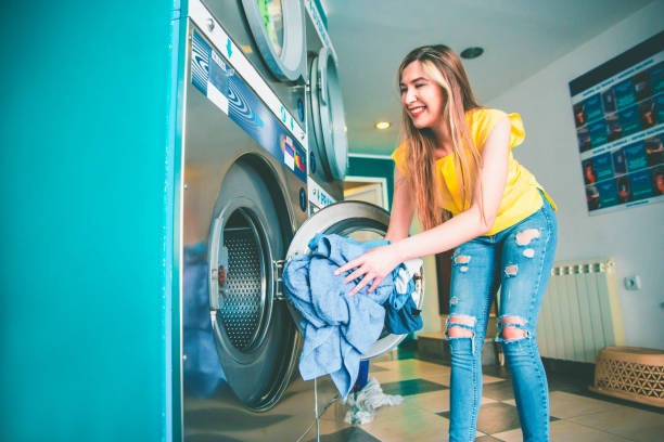 istock Woman at laundry service 1156697684