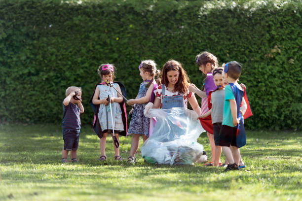 Caucasian family collect garbage from forest