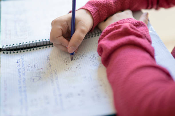 istock ten year old girl going homework 1156701298