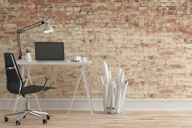 istock Workdesk with decoration and copy space - brick wall 1156702638