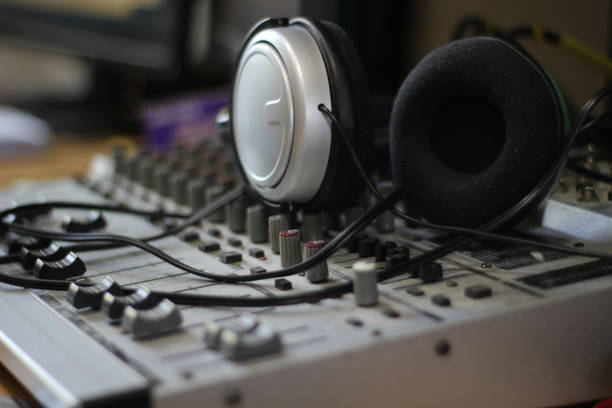 istock Headphones in music studio 1156705224