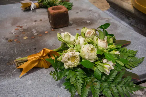 In the Thai temple, lotus flowers are placed on the altar. To show respect