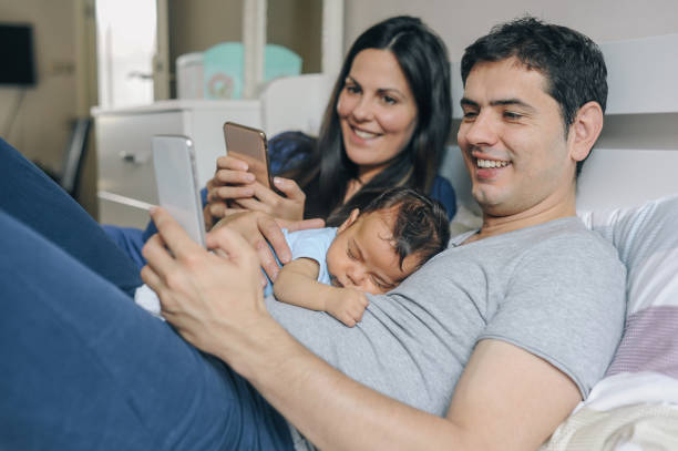 istock Parents spending time with their newborn baby 1156709806
