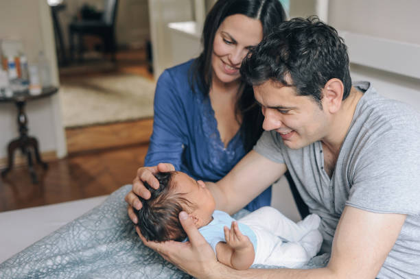 istock Parents spending time with their newborn baby 1156709831
