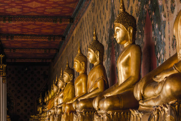 istock Golden Buddha statue on the pedestal 1156709952