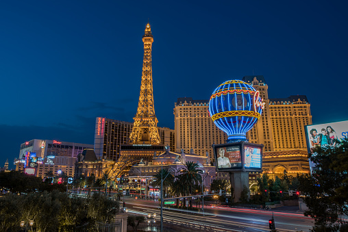 Las Vegas,  Nevada, United States - September 27, 2023: Hotel, replica of the Eiffel Tower, and air balloon of the Paris Paris hotel and casino at the Las Vegas Strip