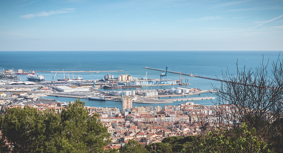 Ramsgate, UK - April 20 2022 Panoramic image of the historic Royal Harbour at dusk. The inner and outer basin of the harbour, plus the harbour wall and light house can be seen.