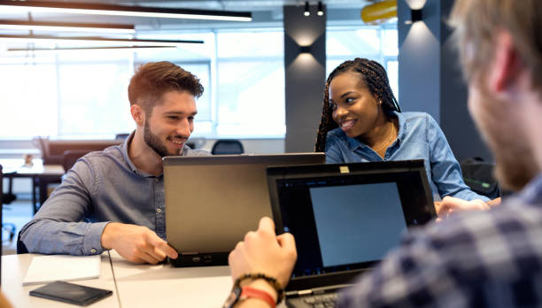 istock Young coworkers in modern office 1156712044