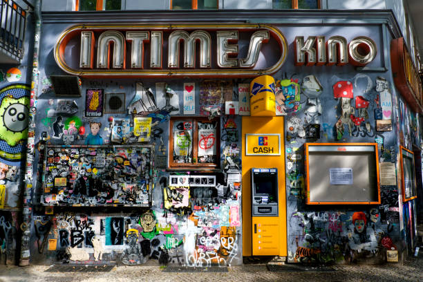 Street scene in the trendy Simon-Dach neighborhood of Berlin. This is a movie theater.