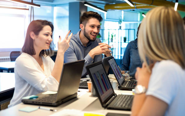 istock Young coworkers in modern office 1156712176